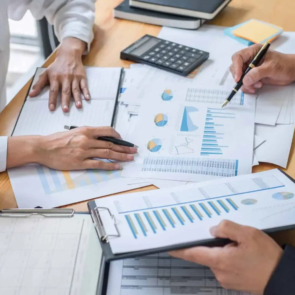 Business bookkeeping meeting reviewing financial reports